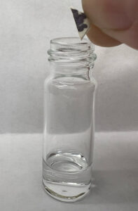 put half a hit of blotter in the vial